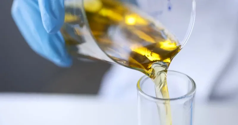 Pharmadrops product being poured in a lab